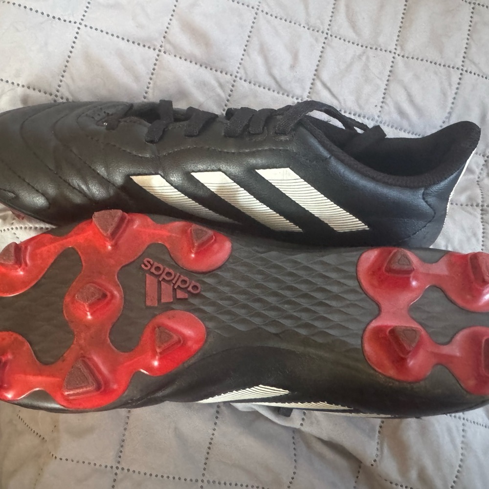 adidas Black Soccer Cleats with Red Studs and White Stripes
